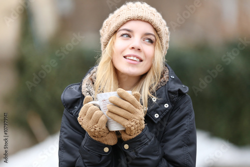 Beautiful girl enjoying a c...