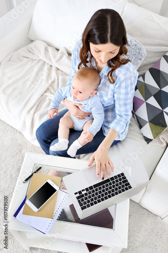 Beautiful woman with baby b...