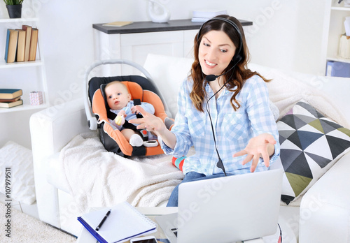 Beautiful woman with baby b...