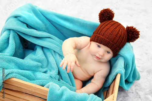 Adorable baby in brown knit...