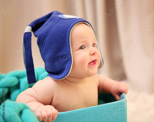 Adorable baby in funny hat ...
