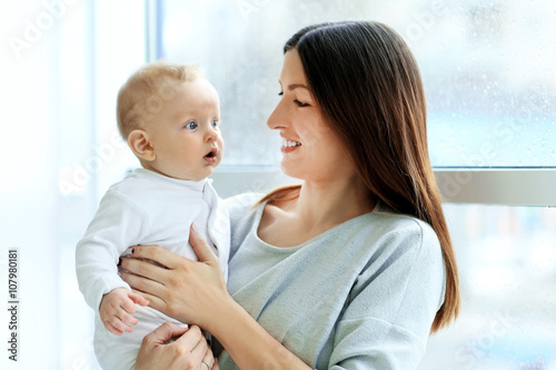 Beautiful woman with baby b...