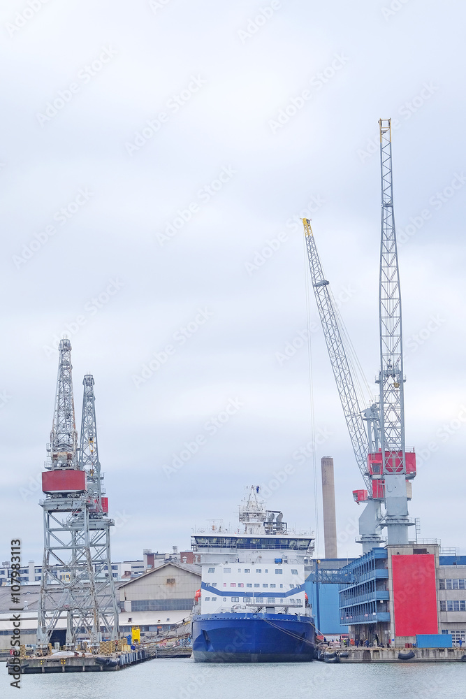 Helsinki, Finland - March, 14, 2016: boats in a harbour of Helsinki, Finland Helsinki, Finland - March, 14, 2016: boats in a harbour of Helsinki, Finland