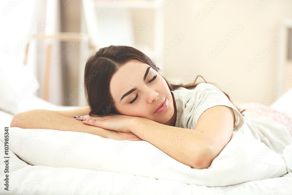 Beautiful young girl sleeping in the bedroom. Beautiful young girl sleeping in the bedroom.