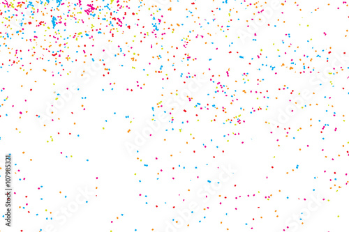 Abstract overlay background concept falling colourful confetti. Random round tiny glitter for brush pattern and texture. Carnival Celebration or Holi Festival celebration splash of colour.