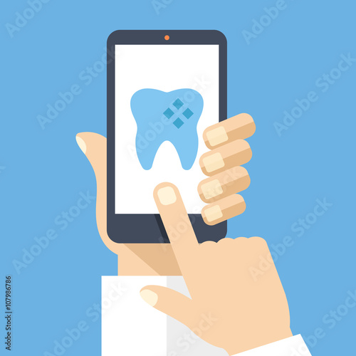 Hand holding smartphone with dental app on screen. Flat design vector illustration