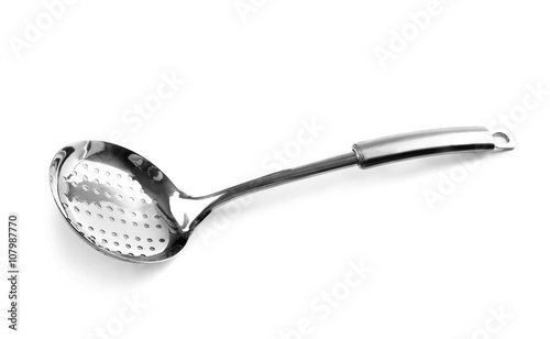 Silver strainer spoon, isolated on white photo