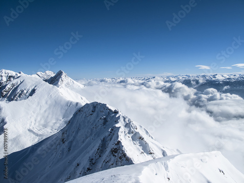 Wintertime early morning sea of clouds – mountain top Austrian