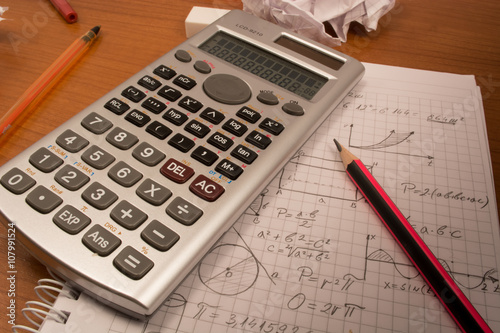 Fotografie Calculator with pencil and eraser