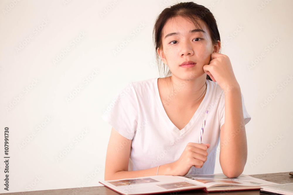 asia thai china student university beautiful girl write a book. asia thai china student university beautiful girl write a book.