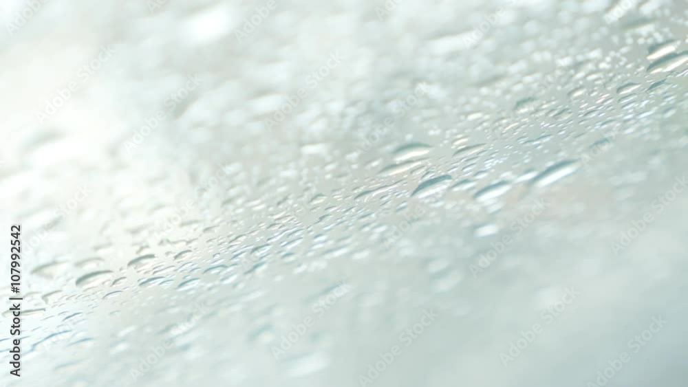 Shiny wind shield glass shallow DOF under rain 4K 2160p UltraHD footage - Raindrops over windscreen slow falling 4K 3840X2160 UHD video Shiny wind shield glass shallow DOF under rain 4K 2160p UltraHD footage - Raindrops over windscreen slow falling 4K 3840X2160 UHD video