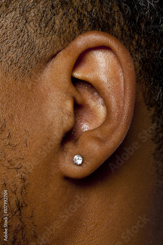 men's ear with earring