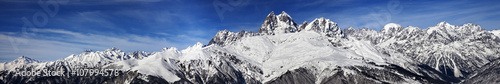 Large panoramic view on Mount Ushba at sunny day