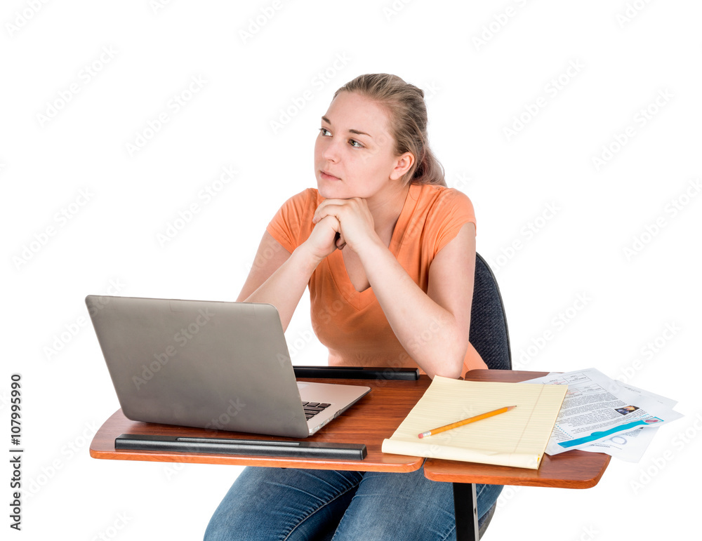 Young adult student with laptop looking off Young adult student with laptop looking off