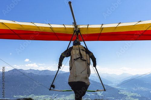 Hang glider take off in Austrian Alps.