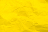 Vivid yellow color crumpled paper texture background