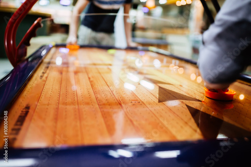 Air hockey is fun even for adults