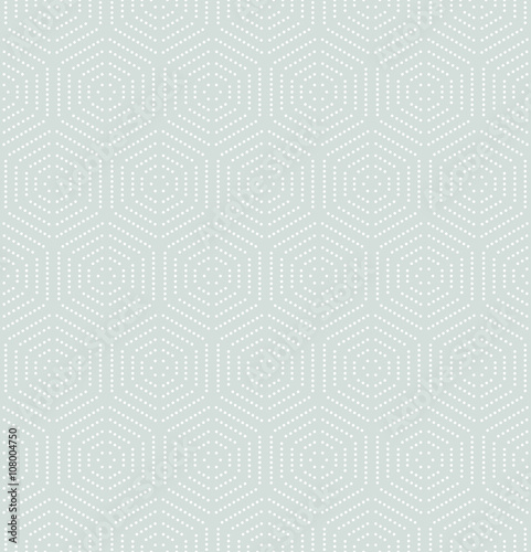Geometric repeating ornament with white dotted hexagons. Seamless abstract modern pattern
