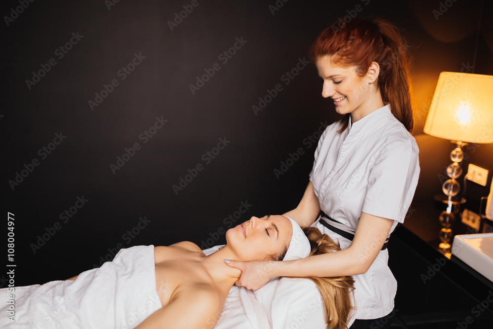 Beautiful woman enjoying massage Beautiful woman enjoying massage