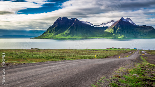 Mountain road leading to the peaks and fjords, Iceland