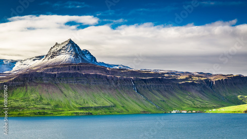 Volcanic mountain over fjord, Iceland