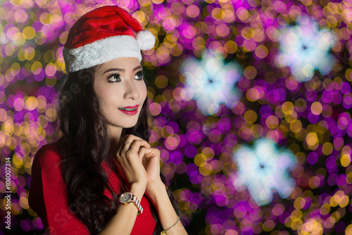 portrait of beautiful sexy girl wearing santa claus clothes