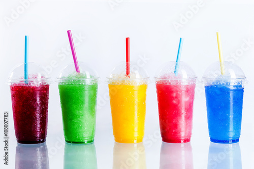 Row of Frozen Fruit Slushies in Plastic Cups