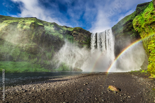 Waterfall Skogafoss and rai...