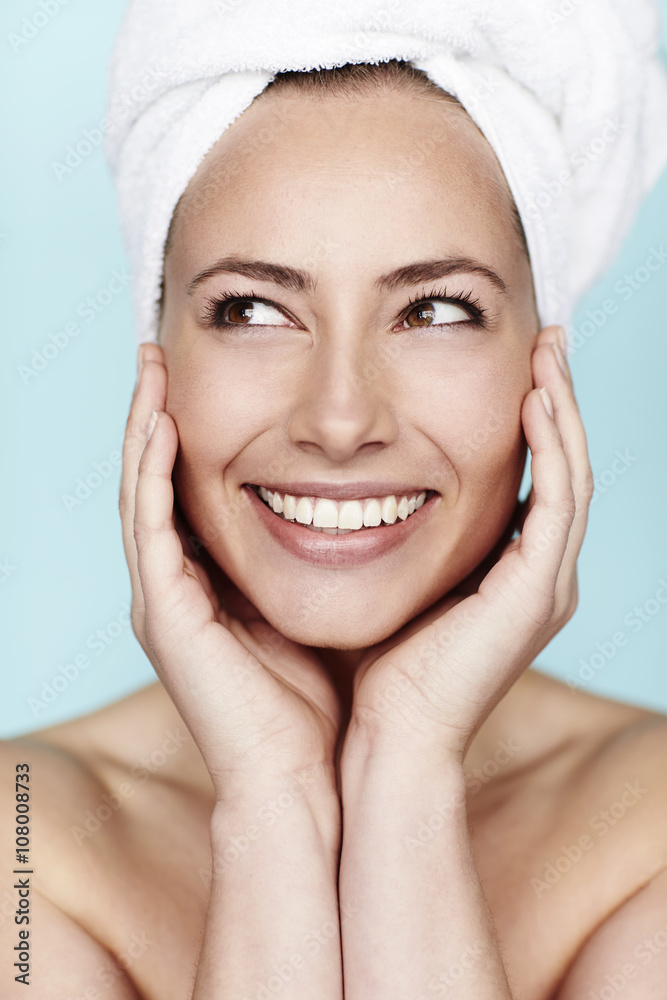 Beautiful smiling woman looking away, close up Beautiful smiling woman looking away, close up