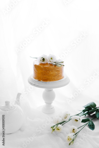 Decorated golden naked cake rustic style for weddings, birthdays and events
