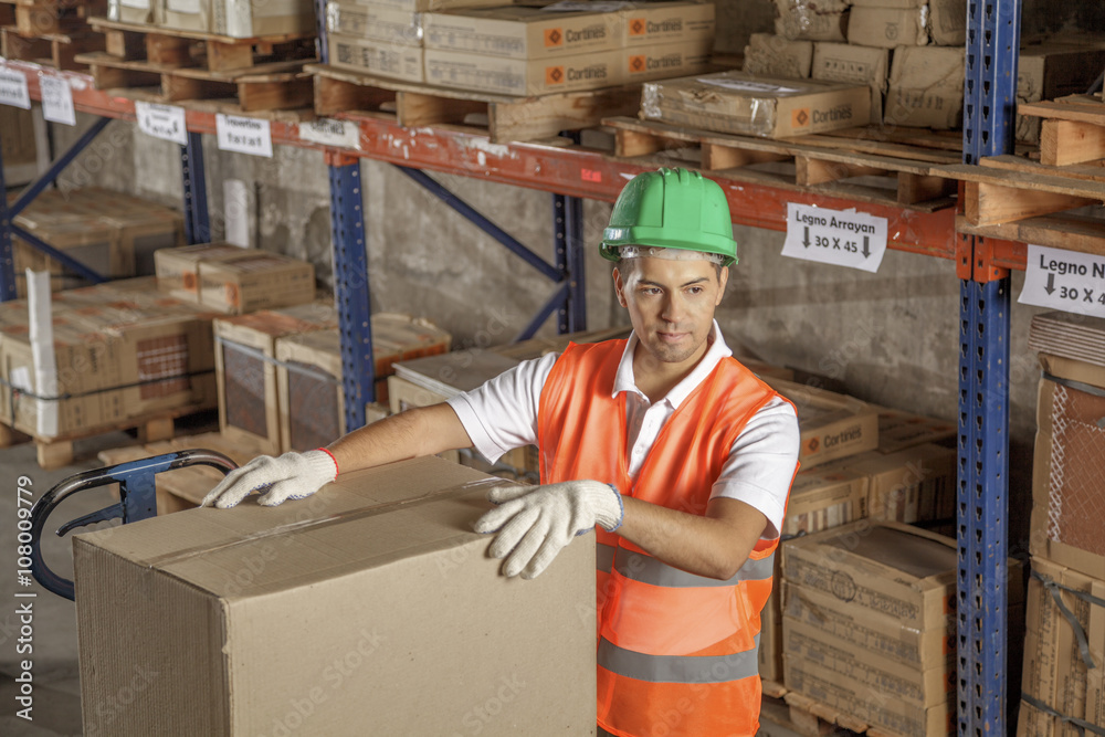 Workers In Warehouse Preparing Goods For shipping