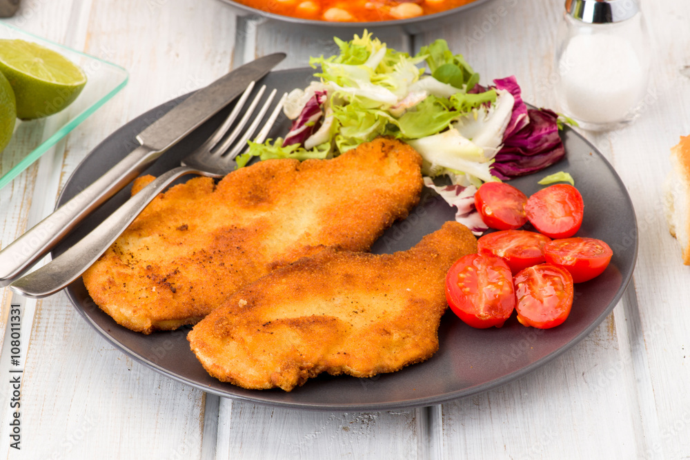 breaded fillets with salad breaded fillets with salad