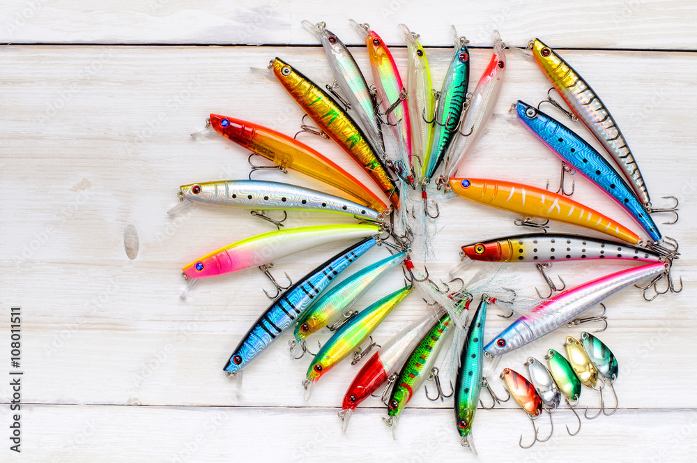 Colorful Fishing Lures on wood desk