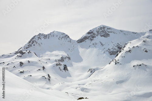 Winter snow covered mountain peaks in Europe © Jure Korosec