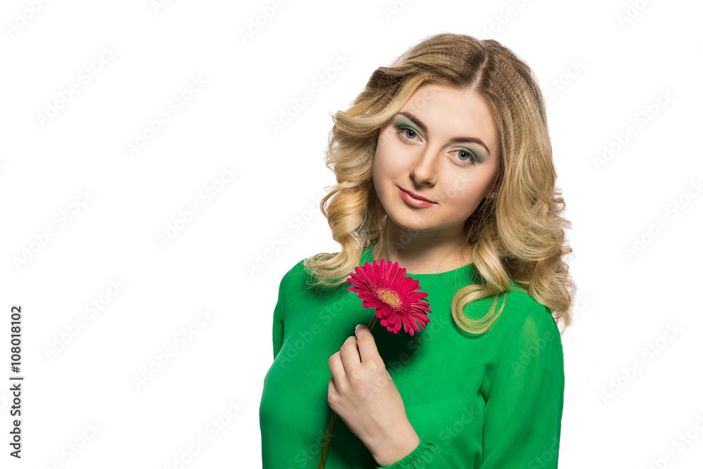 portrait of a beautiful blonde woman that is looking at the camera holding a gerbera flower on isolate white background portrait of a beautiful blonde woman that is looking at the camera holding a gerbera flower on isolate white background