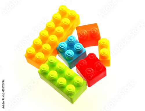 Plastic toy blocks on white background