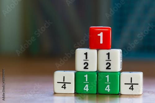 Stacked up fraction dices