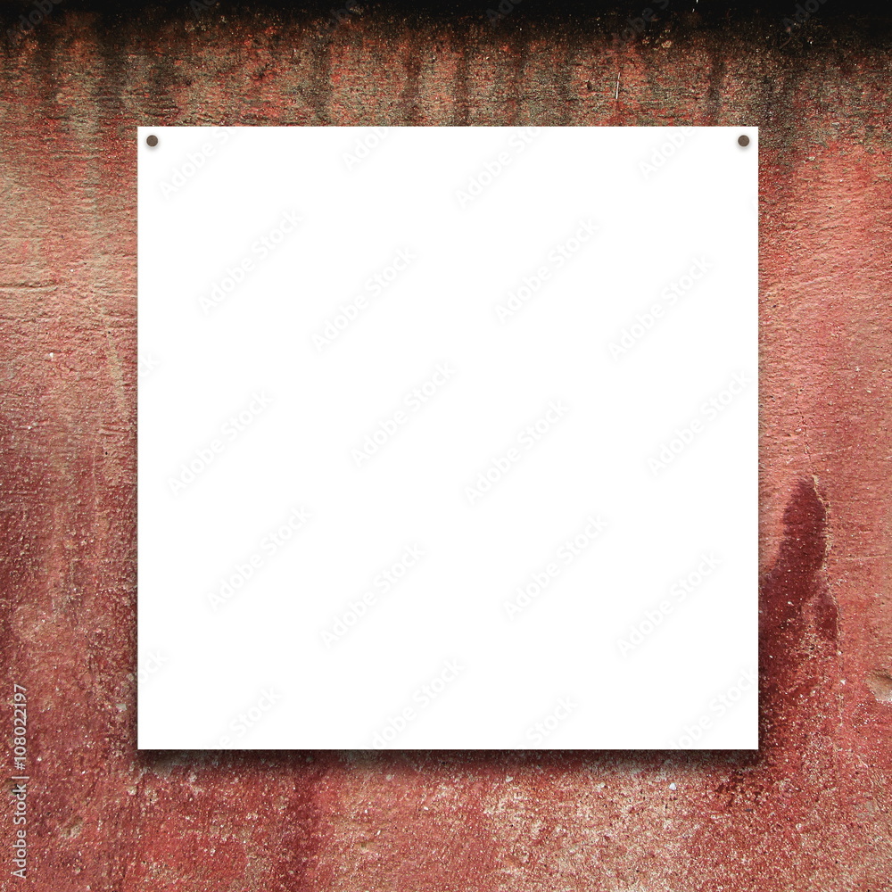 Close-up of one nailed blank square frame on red stained concrete wall background Close-up of one nailed blank square frame on red stained concrete wall background