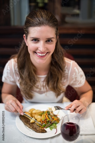 High angle portrait of happy woman having food