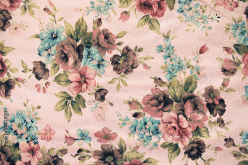 Fragment of colorful retro tapestry textile pattern with floral photo