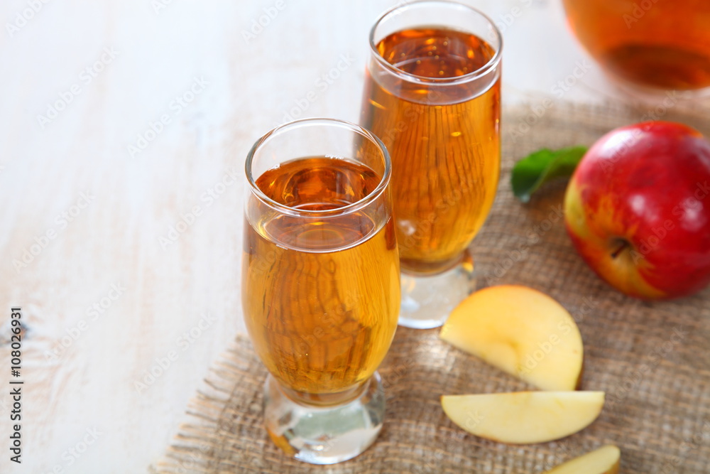 Apple juice and fresh red apples Apple juice and fresh red apples