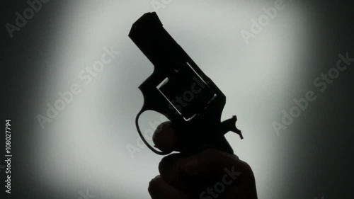 black silhouette gun. Handheld revolver gun