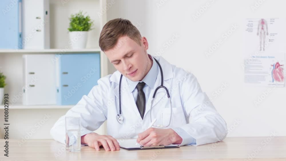 Professional doctor sitting at the table Professional doctor sitting at the table