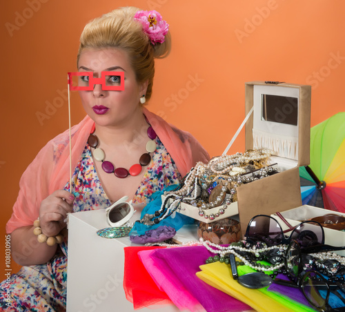 Young woman with her accessories collection photo