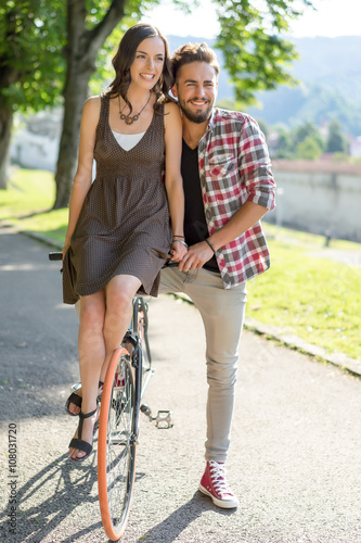 couple smiling on bike