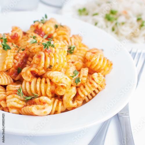 pasta radiatore with tomato sauce, italian cuisine