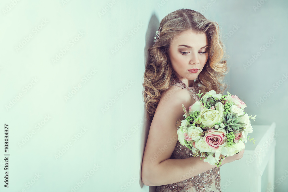Beautiful bride in wedding dress. Portrait of young bride. Studio shot.
Beautiful bride in wedding dress. Portrait of young bride. Studio shot.