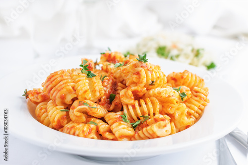 pasta radiatore with tomato sauce, italian cuisine