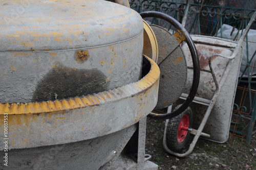 cement mixer and wheelbarrow