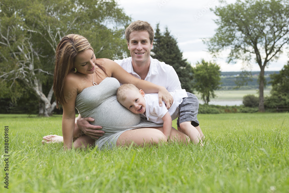 Fototapeta premium Family together in the summer park with a son